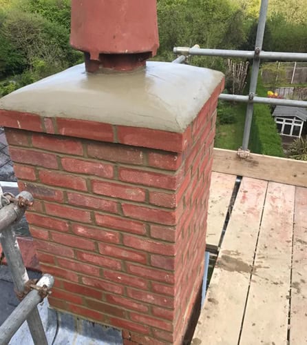Photo showing chimney flaunching being repaired on a Cranleigh&nbsp; home by JBL Chimney Services